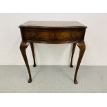 A REPRODUCTION WALNUT FINISH SERPENTINE FRONTED SINGLE DRAWER SIDE TABLE. WIDTH 70cm. HEIGHT 79cm.