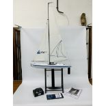 HELION AURA 650 RC SAILING YACHT ON STAND WITH TRANSMITTER & INSTRUCTIONS - SOLD AS SEEEN