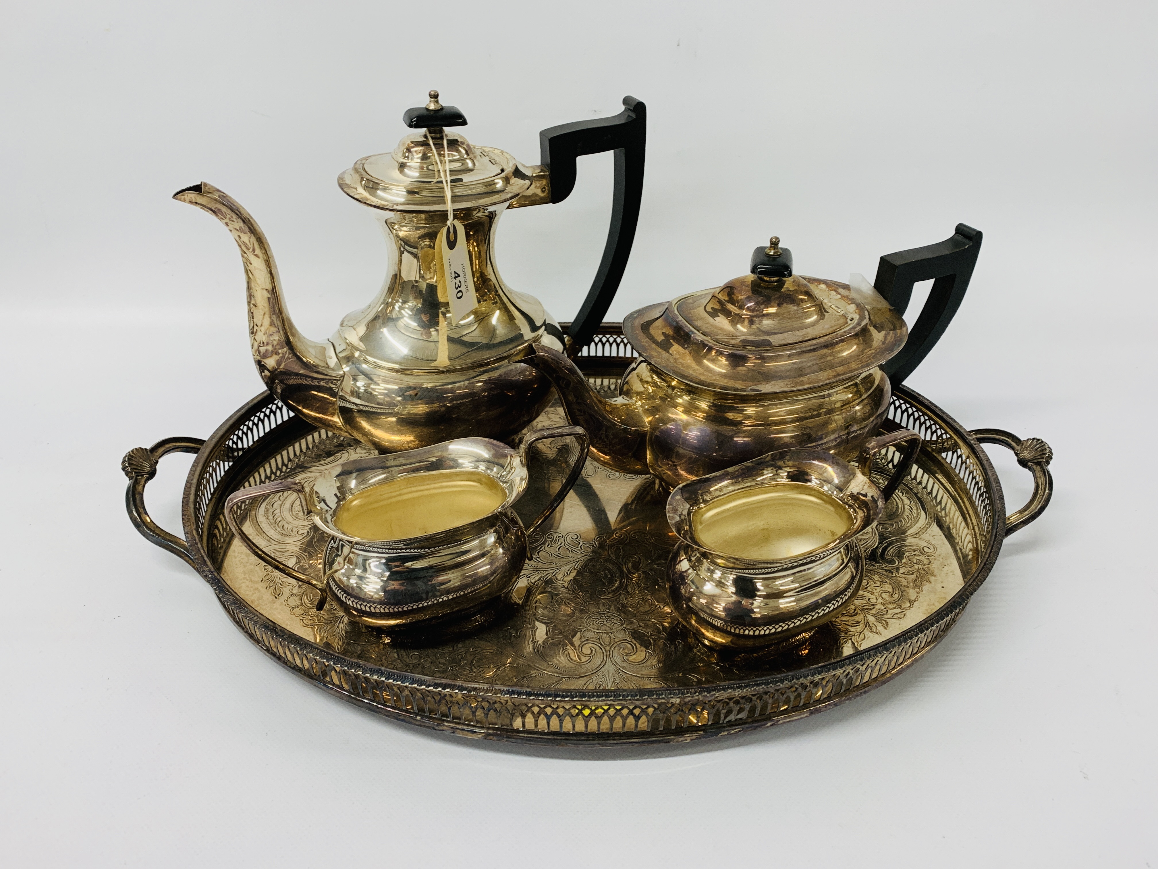 PLATED 4 PIECE TEASET TOGETHER WITH 2 HANDLED TRAY ENGRAVED DETAIL