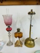 TWO SINGLE BURNER TABLE OIL LAMPS, ONE WITH CRANBERRY GLASS FONT AND ETCHED PINE TO PALE SHADE,