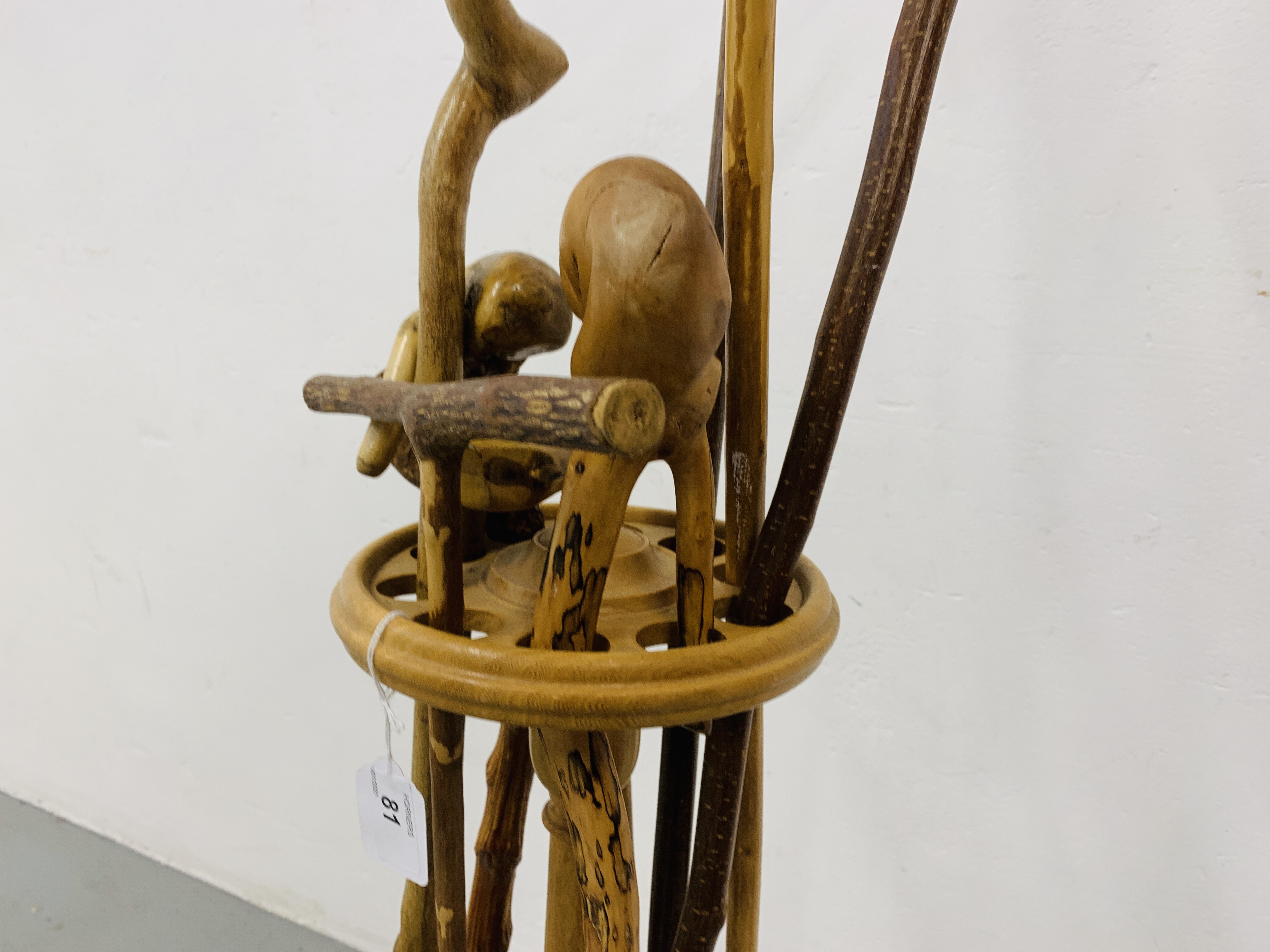 A HAND TURNED STAND CONTAINING A COLLECTION OF WALKING STICKS - Image 4 of 9