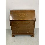 AN EDWARDIAN MAHOGANY THREE DRAWER BUREAU WITH WELL FITTED INTERIOR,