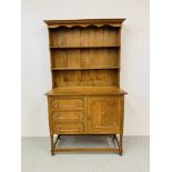 A SOLID LIGHT OAK TRADITIONAL DRESSER. WIDTH 107cm. HEIGHT 186cm. DEPTH 49cm.