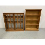 A SATINWOOD TWO DOOR BOOKCASE WITH GLASS TO BACK, WIDTH 92CM, HEIGHT 87CM,