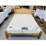 A SOLID PINE DOUBLE BEDSTEAD COMPLETE WITH MATTRESS