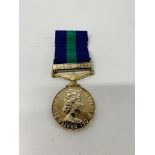 A ROYAL ARMY MEDICAL CORPS SUEZ CANAL ZONE SERVICE MEDAL AWARDED TO PTE J.W.