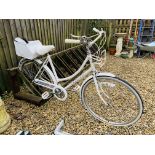 A LADIES RALEIGH CAPRICE THREE SPEED BICYCLE