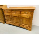 A SOLID PINE THREE DRAWER DRESSER BASE - LENGTH 147cm. HEIGHT 91cm.