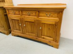 A SOLID PINE THREE DRAWER DRESSER BASE - LENGTH 147cm. HEIGHT 91cm.