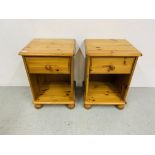 A PAIR OF HONEY PINE SINGLE DRAWER BEDSIDE CABINETS AND SOLID PINE DOUBLE HEADBOARD