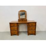 A MARKS & SPENCER HONEY PINE TWIN PEDESTAL DRESSING TABLE WITH HONEY PINE TWO DRAWER VANITY MIRROR