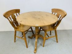 A HONEY PINE PEDESTAL BREAKFAST TABLE WITH PAIR OF TRADITIONAL BEECHWOOD KITCHEN DINING CHAIRS