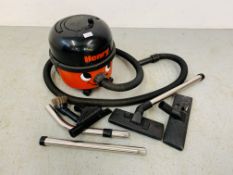 A NUMATIC "HENRY" VACUUM CLEANER WITH ACCESSORIES - SOLD AS SEEN