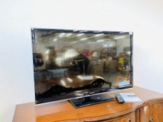 A PANASONIC VIERA 42 INCH TELEVISION MODEL TX-L42E5B WITH REMOTE AND INSTRUCTIONS - SOLD AS SEEN