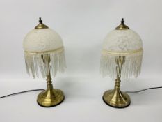 A PAIR OF DECO STYLE TABLE LAMPS WITH WHITE MARBELLED GLASS AND FRINGED SHADES - SOLD AS SEEN