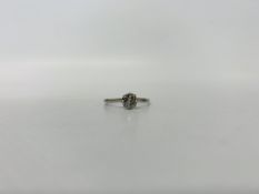 A PLATINUM SOLITAIRE DIAMOND RING