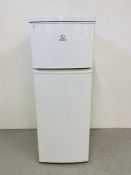 AN INDESIT FRIDGE FREEZER HEIGHT 145cm - SOLD AS SEEN