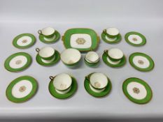 A COALPORT GREEN AND GILT DECORATED 21 PIECE FINE BONE CHINA TEASET + 22 PIECES OF ROYAL DOULTON