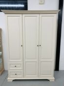 A CREAM FINISH 3 DOOR MODERN COMBINATION WARDROBE W 150CM. H 200CM. D 61CM.