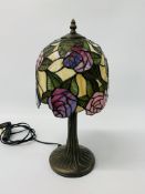 A REPRODUCTION TIFFANY STYLE TABLE LAMP, THE LEADED SHADE DECORATED WITH ROSES.