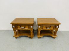 A PAIR OF STAINED PITCH PINE SIDE TABLES WITH DRAWER AND LOWER SHELF WITH CAST METAL AND PORCELAIN