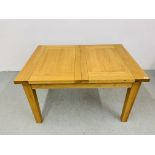 A MODERN LIGHT OAK EXTENDING DINING TABLE - SIZE 132CM X 92CM (WITH EXTENSION LEAF 33CM)