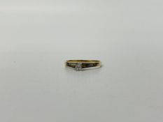 A 9CT GOLD SOLITAIRE DIAMOND RING