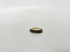 A LADIES 9CT GOLD RING SET WITH BLUE AND WHITE STONES