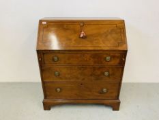 AN ANTIQUE MAHOGANY 3 DRAWER BUREAU WITH INLAID DETAIL & BRASS HANDLES AND FITTED INTERIOR.