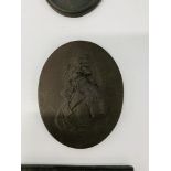 Two black basalt portrait medallions,