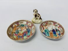 Two Chinese Qianlong polychrome saucers along with a C19th model of a spaniel (A/F)