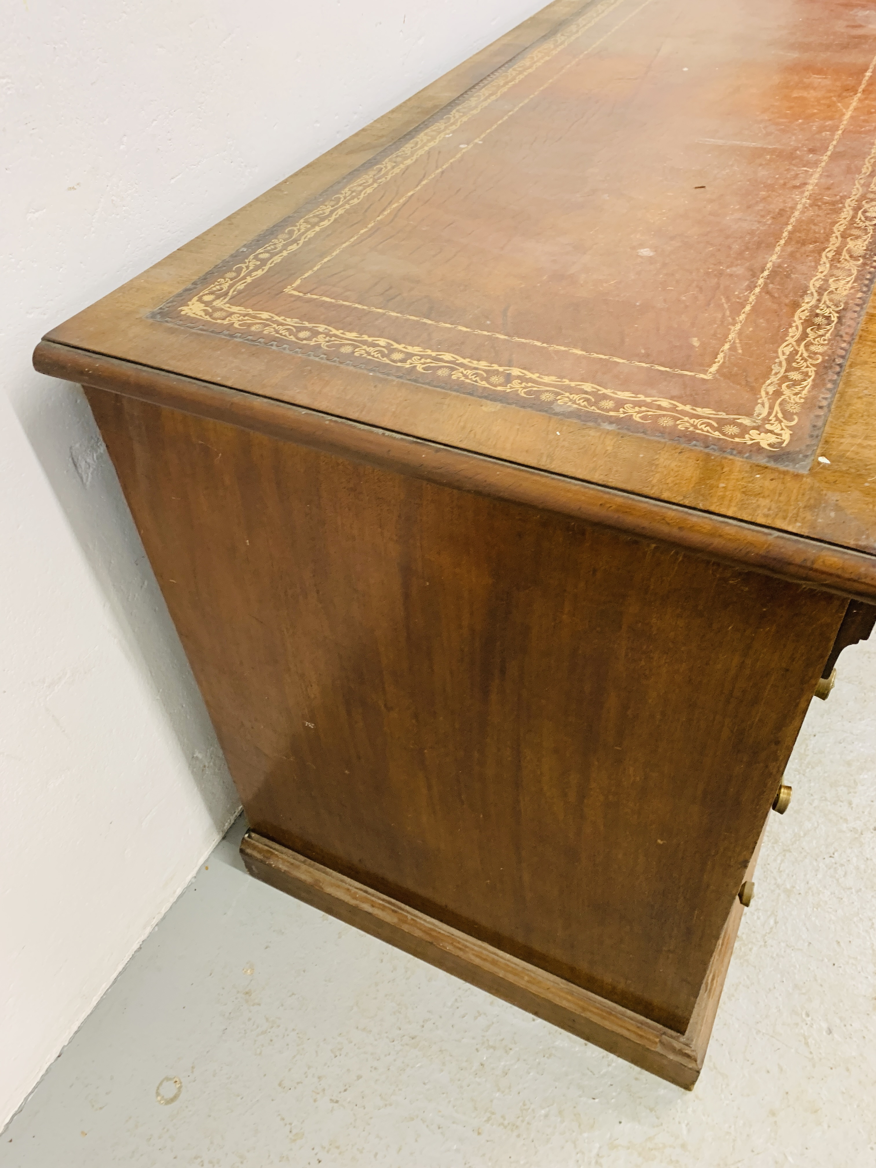 An Edwardian mahogany single piece nine drawer pedestal desk with inlaid tan leather top, - Image 15 of 18