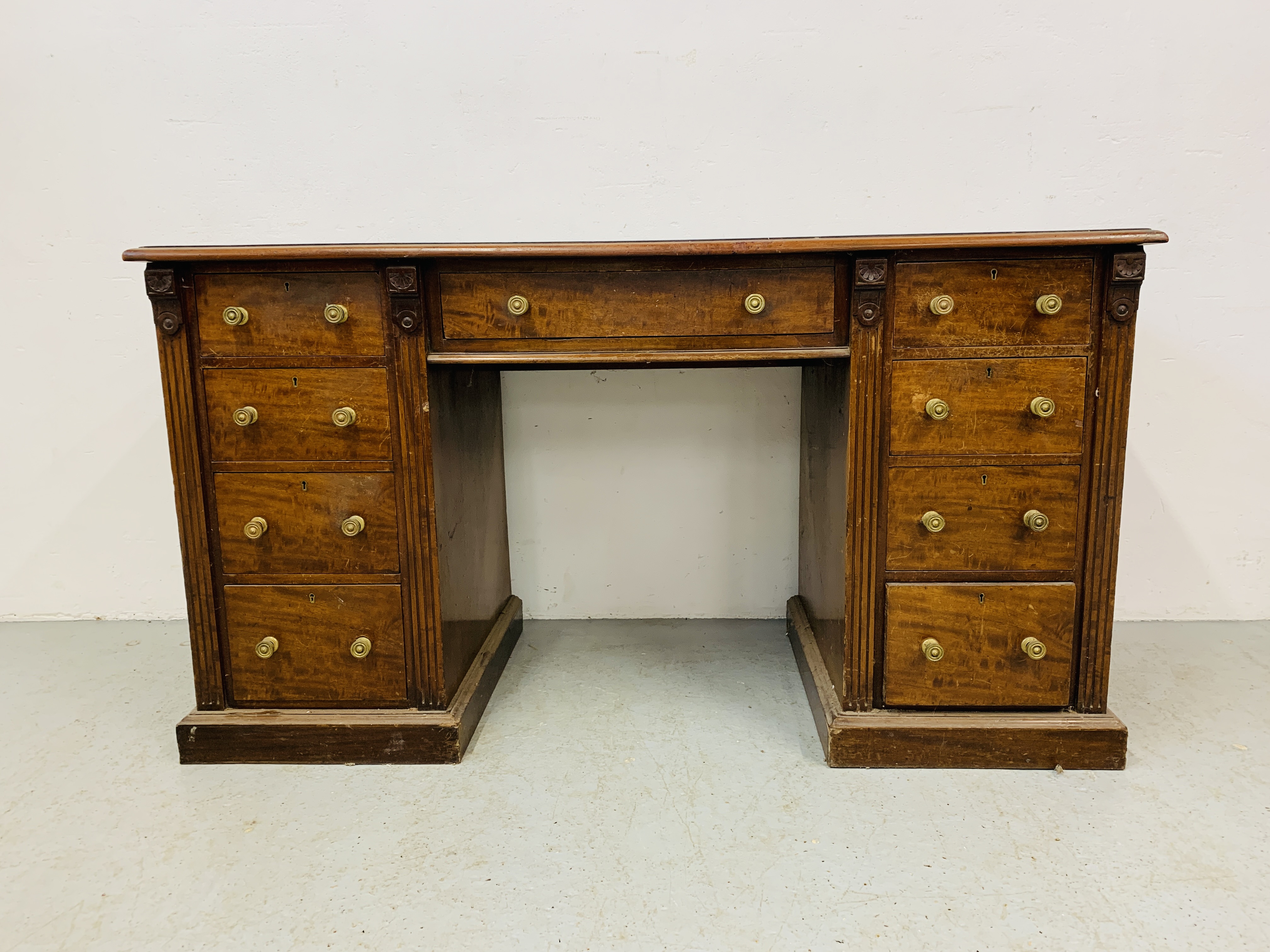 An Edwardian mahogany single piece nine drawer pedestal desk with inlaid tan leather top, - Image 3 of 18