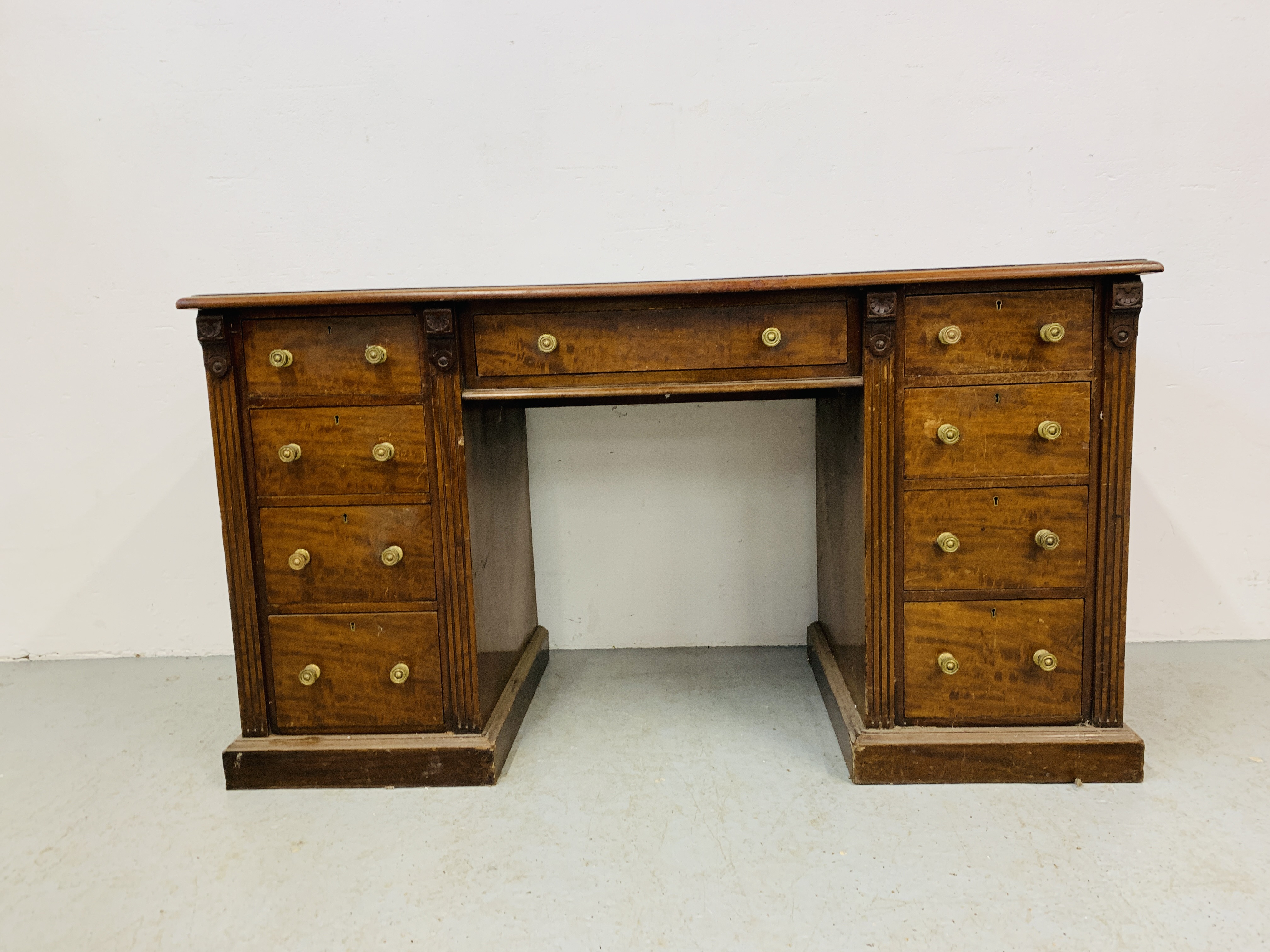 An Edwardian mahogany single piece nine drawer pedestal desk with inlaid tan leather top, - Image 9 of 18