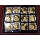 WINDSOR MINT 2017 PORTRAITS OF A QUEEN SET OF TWELVE 50mm GOLD PLATED PROOF STRIKES IN PRESENTATION