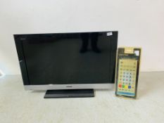 A SONY BRAVIA 32 INCH TELEVISION PLUS OVERSIZE REMOTE - SOLD AS SEEN
