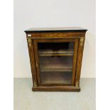 A Victorian walnut and gilt metal mounted single door cabinet