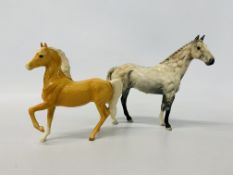 A ROYAL DOULTON PALOMINO HORSE "PRANCING" OVERALL HEIGHT 17cm and ROYAL DOULTON HUNTER GREY HORSE.