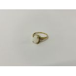 A 9CT GOLD OPAL RING WITH DIAMOND SET SHOULDERS