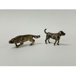 Two silver miniature models of dogs