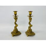 A pair of French gilt metal dolphin candlesticks, height 25.