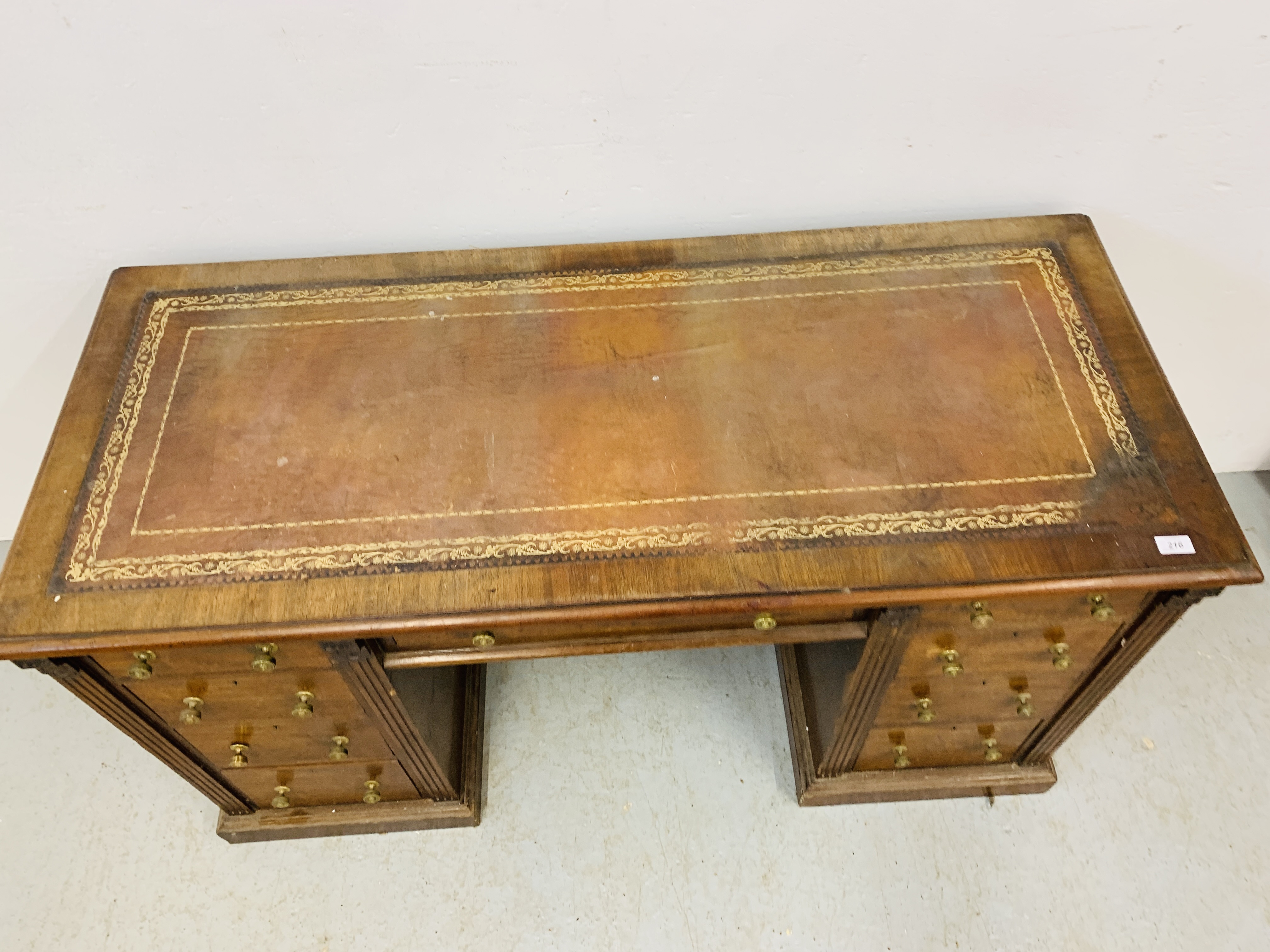 An Edwardian mahogany single piece nine drawer pedestal desk with inlaid tan leather top, - Image 10 of 18