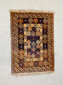 AN ORIENTAL RUG, THE CENTRAL DESIGN HAVING THREE INTERLOCKED LOZENGES 147 X 106CM.