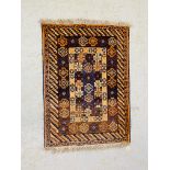 AN ORIENTAL RUG, THE CENTRAL DESIGN HAVING THREE INTERLOCKED LOZENGES 147 X 106CM.