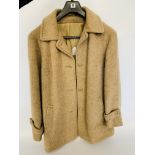 A 100% LAMA WOOL LADIES COAT SIZE 18 AND A THISTLE MILL CASHMERE/WOOL LADIES COAT SIZE 18