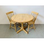 A CIRCULAR DROP SIDE BEECH WOOD KITCHEN TABLE WITH FOUR CHAIRS