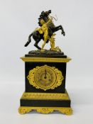 A French bronze and gilt metal mantel clock, the top surmounted with a rearing horse,