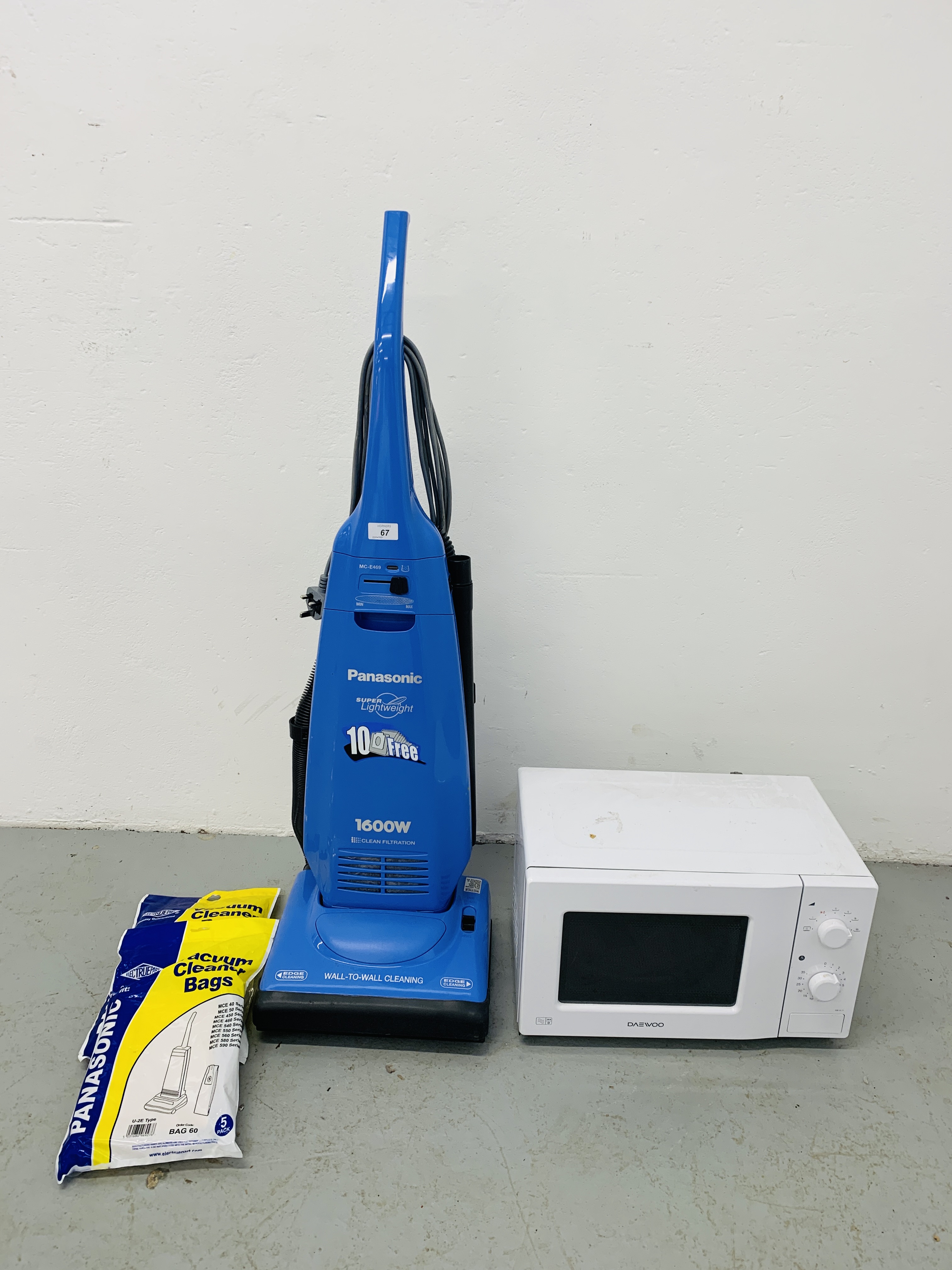 A PANASONIC 1600 WATT VACUUM CLEANER WITH ACCESSORIES PLUS A DAEWOO MICROWAVE OVEN - SOLD AS SEEN