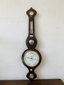 AN EARLY C19TH ROSEWOOD WHEEL BAROMETER