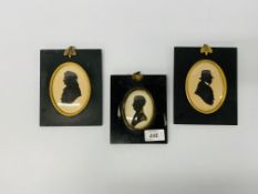 A pair of C19th silhouettes, signed in pencil ‘Sleight’ along with a silhouette of a gentleman,